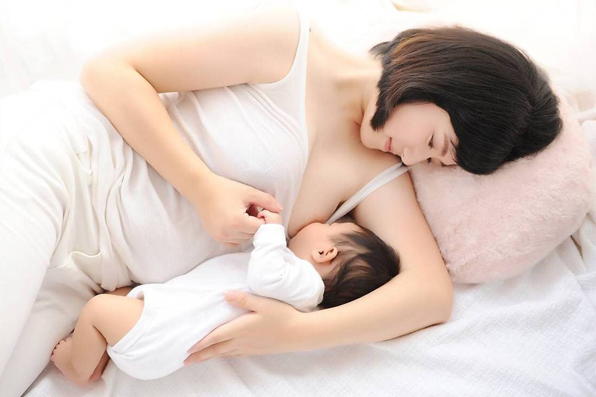 Mother Breastfeeding her baby